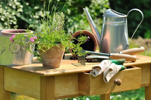 Final touch on a professionally landscaped Gipsy Hill garden